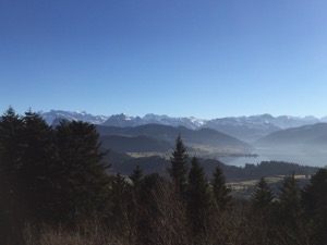 View from the top of Etzel taking in the mountains in the background and the Sihlsee.