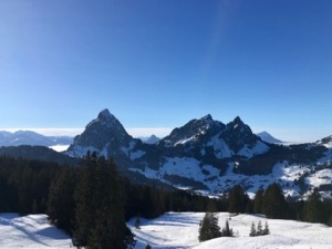 View over the Grosser and Kleine Mythen with cloud filled valleys in background