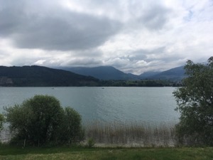 View over Zurisee under grey clouds