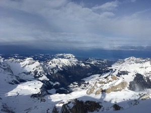 View from the peak at Engelberg, over the snow capped mountains and hills of Switzerland