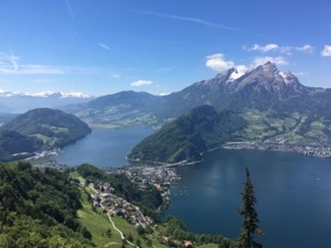 View of Pilatus, with the last traces of snow on the peak, viewed over the lake.