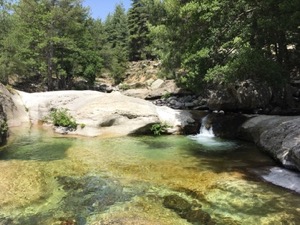 Rock pools fed by a stream