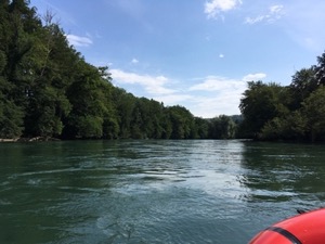 View down the river Ruess, with tree lined banks.