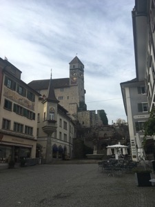 View up towards the clock tower in Rapperswil castle.