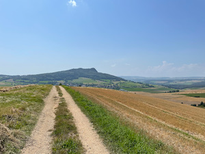 View over corn fields and hills near Tingen