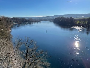 The Rhine under blue skies and with clear water. Sunlight reflecting off the surface.