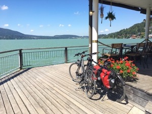 Bikes in front of a lake.