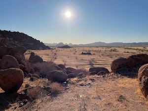 Sunrise over the dessert - hills in the background.