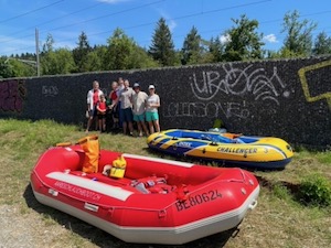 The gang with rafts laid out in front.